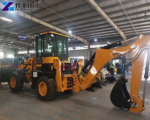 small backhoe loader at factory